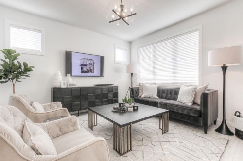 34 Bridgeport Circle, Chestermere, AB - Indoor Photo Showing Living Room