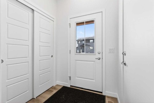 50 Creekside Way Sw, Calgary, AB - Indoor Photo Showing Other Room