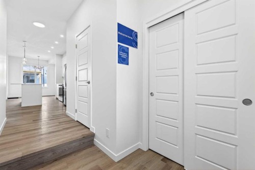 50 Creekside Way Sw, Calgary, AB - Indoor Photo Showing Other Room
