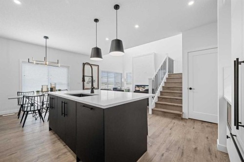 447 Dawson Terrace, Chestermere, AB - Indoor Photo Showing Kitchen With Upgraded Kitchen