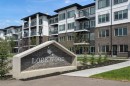 1318-6 Merganser Drive West, Chestermere, AB  - Outdoor With Balcony With Facade 