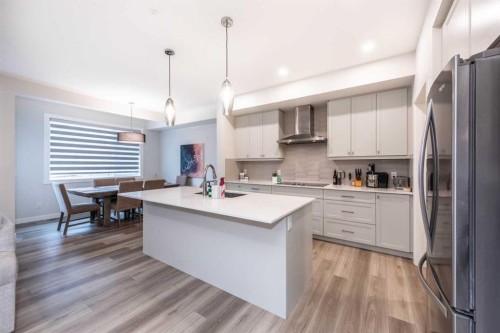 137 Edith Villas Nw, Calgary, AB - Indoor Photo Showing Kitchen With Upgraded Kitchen
