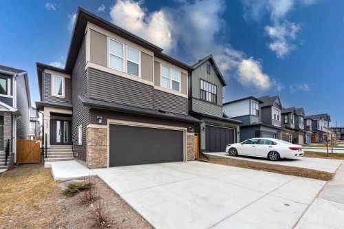 137 Edith Villas Nw, Calgary, AB - Outdoor With Facade