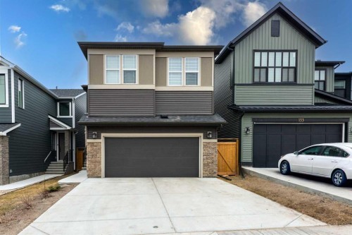 137 Edith Villas Nw, Calgary, AB - Outdoor With Facade
