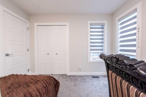 137 Edith Villas Nw, Calgary, AB - Indoor Photo Showing Bedroom