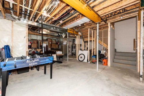 137 Edith Villas Nw, Calgary, AB - Indoor Photo Showing Basement
