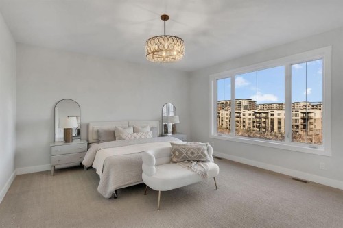 28 Spring Creek Point Sw, Calgary, AB - Indoor Photo Showing Bedroom