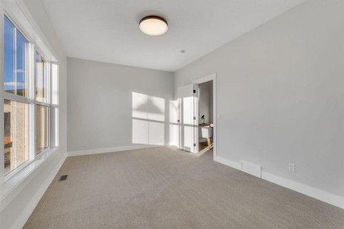28 Spring Creek Point Sw, Calgary, AB - Indoor Photo Showing Other Room