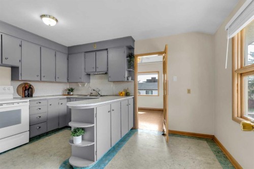 403 30 Avenue Nw, Calgary, AB - Indoor Photo Showing Kitchen With Double Sink