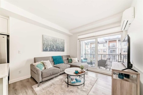 311-40 Walgrove Walk Se, Calgary, AB - Indoor Photo Showing Living Room