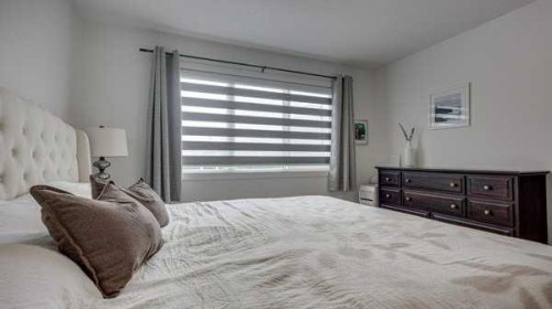 B-10 Evergreen Way, Red Deer, AB - Indoor Photo Showing Bedroom