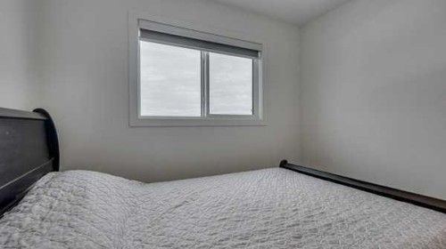 B-10 Evergreen Way, Red Deer, AB - Indoor Photo Showing Bedroom