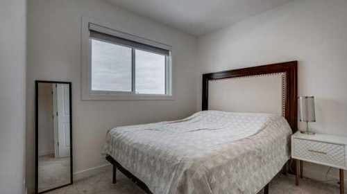 B-10 Evergreen Way, Red Deer, AB - Indoor Photo Showing Bedroom