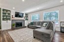 11835 Elbow Drive Sw, Calgary, AB  - Indoor Photo Showing Living Room With Fireplace 