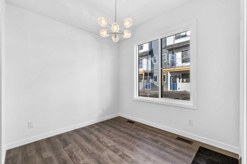 54 Creekside Way Sw, Calgary, AB - Indoor Photo Showing Other Room