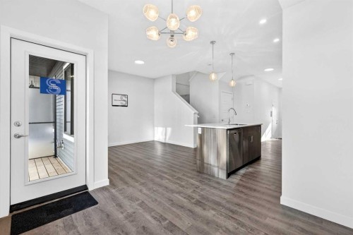 54 Creekside Way Sw, Calgary, AB - Indoor Photo Showing Other Room