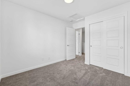 54 Creekside Way Sw, Calgary, AB - Indoor Photo Showing Other Room