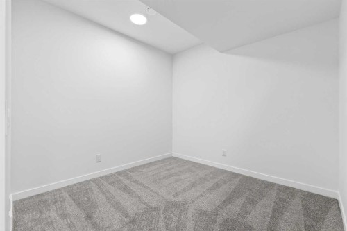 54 Creekside Way Sw, Calgary, AB - Indoor Photo Showing Other Room
