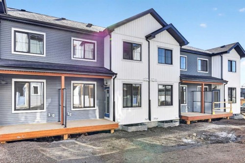 54 Creekside Way Sw, Calgary, AB - Outdoor With Deck Patio Veranda