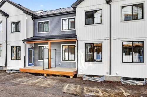 54 Creekside Way Sw, Calgary, AB - Outdoor With Exterior