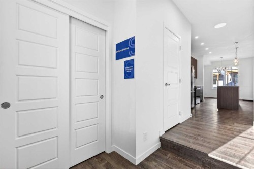 54 Creekside Way Sw, Calgary, AB - Indoor Photo Showing Other Room