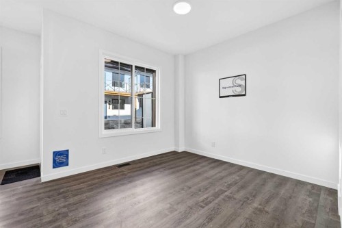 54 Creekside Way Sw, Calgary, AB - Indoor Photo Showing Other Room