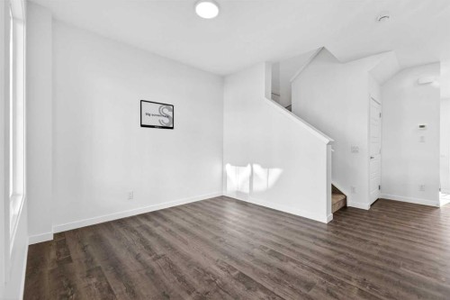 54 Creekside Way Sw, Calgary, AB - Indoor Photo Showing Other Room