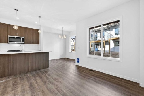 54 Creekside Way Sw, Calgary, AB - Indoor Photo Showing Kitchen