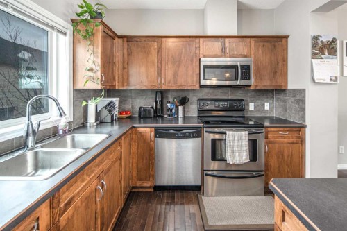 159 Kincora Heath Nw, Calgary, AB - Indoor Photo Showing Kitchen With Double Sink