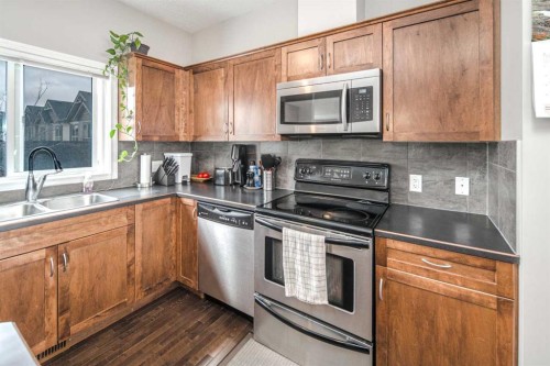 159 Kincora Heath Nw, Calgary, AB - Indoor Photo Showing Kitchen With Double Sink