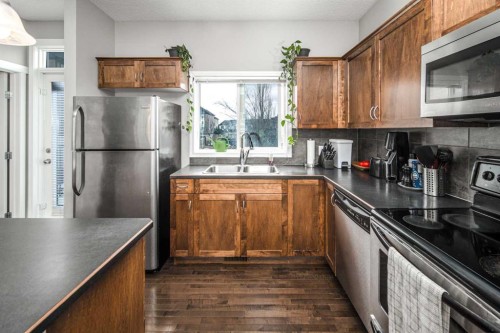 159 Kincora Heath Nw, Calgary, AB - Indoor Photo Showing Kitchen With Double Sink