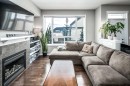 159 Kincora Heath Nw, Calgary, AB  - Indoor Photo Showing Living Room With Fireplace 