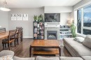 159 Kincora Heath Nw, Calgary, AB  - Indoor Photo Showing Living Room With Fireplace 