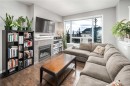 159 Kincora Heath Nw, Calgary, AB  - Indoor Photo Showing Living Room With Fireplace 