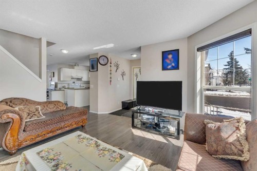 92 Taradale Drive Ne, Calgary, AB - Indoor Photo Showing Living Room