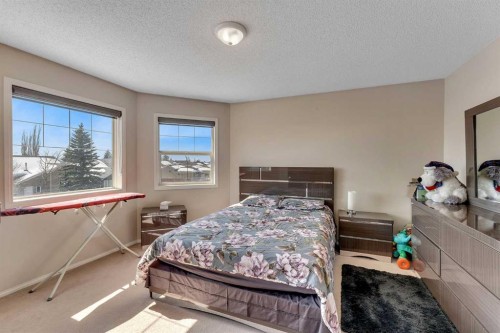 92 Taradale Drive Ne, Calgary, AB - Indoor Photo Showing Bedroom