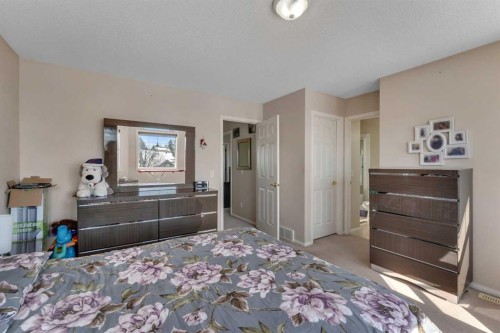 92 Taradale Drive Ne, Calgary, AB - Indoor Photo Showing Bedroom