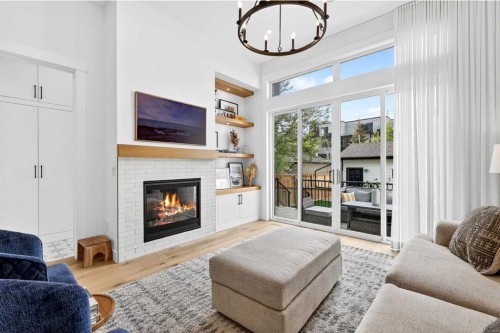 2129 27 Avenue Sw, Calgary, AB - Indoor Photo Showing Living Room With Fireplace