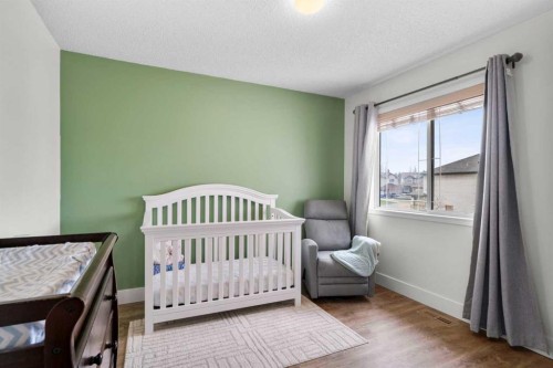 176 Douglas Ridge Green Se, Calgary, AB - Indoor Photo Showing Bedroom