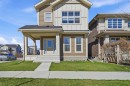 231 Sundown Road, Cochrane, AB  - Outdoor With Facade 