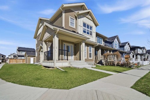 231 Sundown Road, Cochrane, AB - Outdoor With Facade