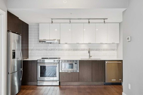 2001-930 6 Avenue Sw, Calgary, AB - Indoor Photo Showing Kitchen With Stainless Steel Kitchen With Upgraded Kitchen