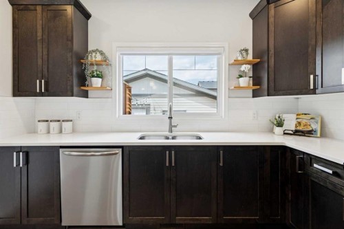 8 Walgrove Green Se, Calgary, AB - Indoor Photo Showing Kitchen With Double Sink