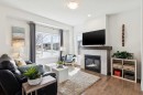 8 Walgrove Green Se, Calgary, AB  - Indoor Photo Showing Living Room With Fireplace 