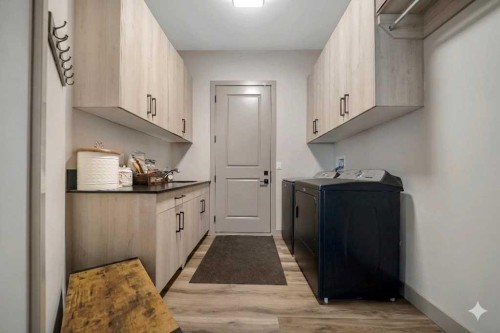 349 Limestone Bay, Balzac, AB - Indoor Photo Showing Laundry Room