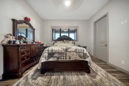 349 Limestone Bay, Balzac, AB - Indoor Photo Showing Bedroom