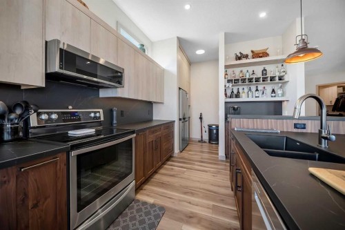 349 Limestone Bay, Balzac, AB - Indoor Photo Showing Kitchen With Double Sink