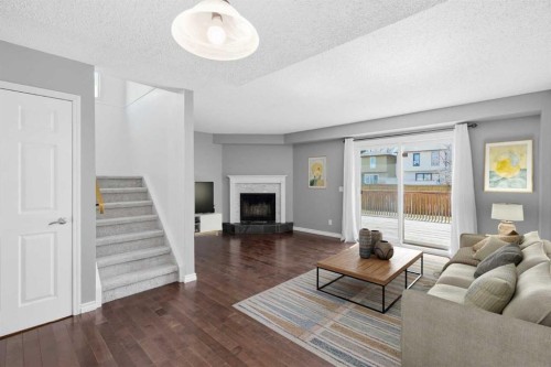 55 Templegreen Drive Ne, Calgary, AB - Indoor Photo Showing Living Room With Fireplace