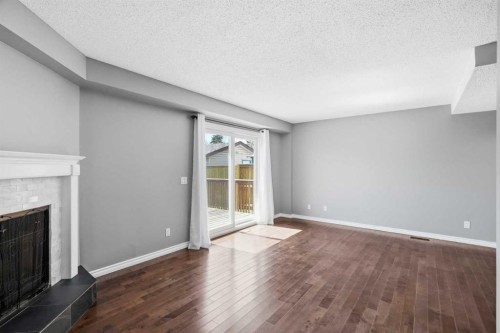 55 Templegreen Drive Ne, Calgary, AB - Indoor With Fireplace