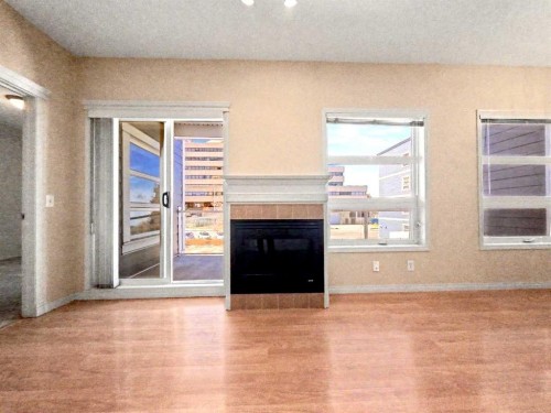 209-333 Riverfront Avenue Se, Calgary, AB - Indoor With Fireplace